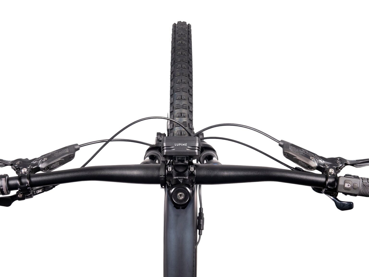 Top view of the Lupine SL Minimax AF headlight and an MTB's controls